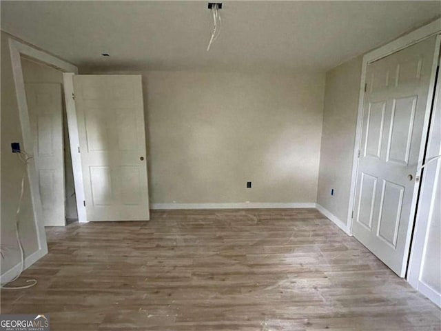 interior space featuring wood-type flooring