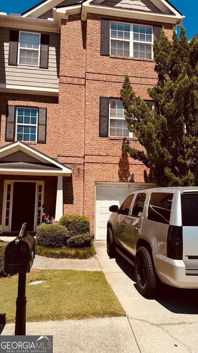 view of front of home with a garage