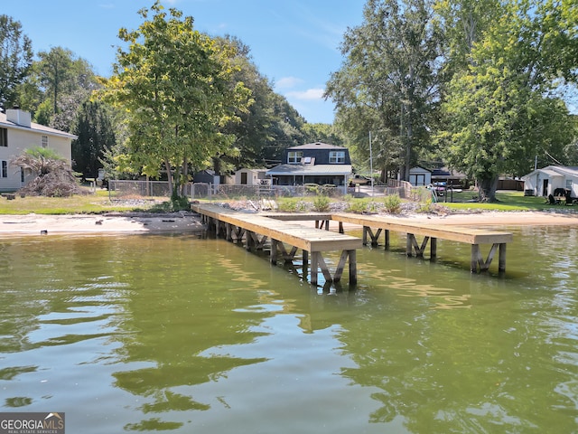 view of dock with a water view