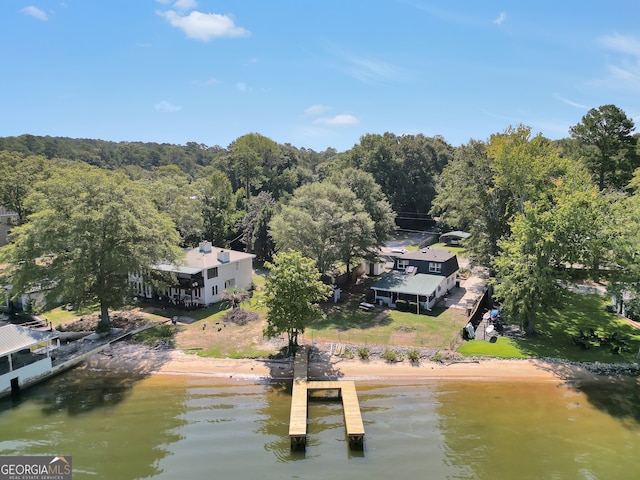 bird's eye view featuring a view of the beach and a water view