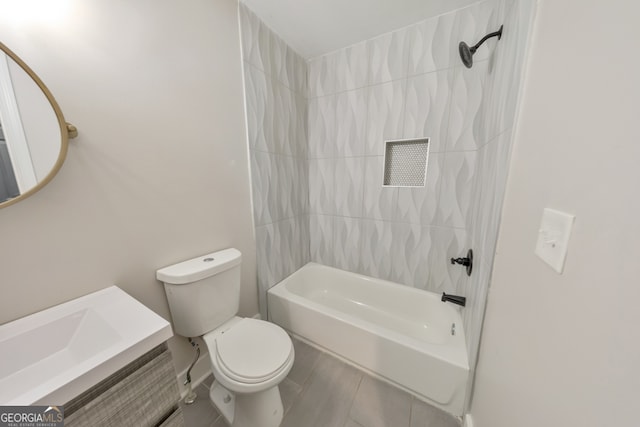 full bathroom featuring vanity, toilet, and tiled shower / bath combo