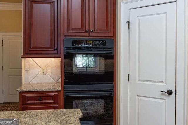 kitchen with decorative backsplash and double oven