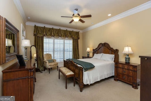 bedroom featuring crown molding, light colored carpet, and ceiling fan