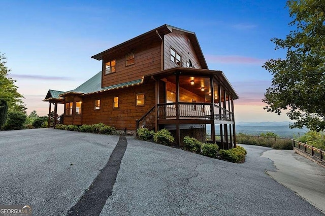 view of property exterior at dusk