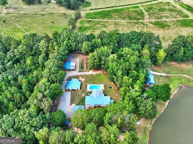 aerial view with a rural view and a water view