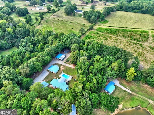 birds eye view of property featuring a rural view