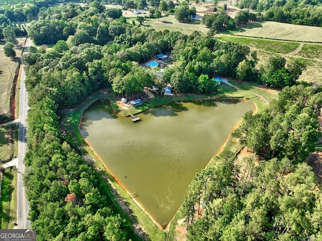 bird's eye view featuring a water view and a rural view