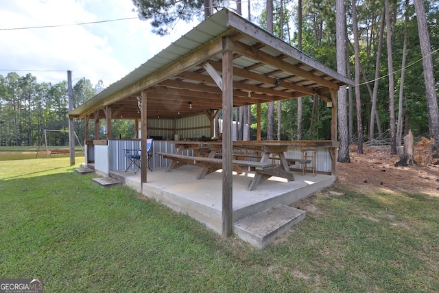 view of home's community featuring a yard and a deck