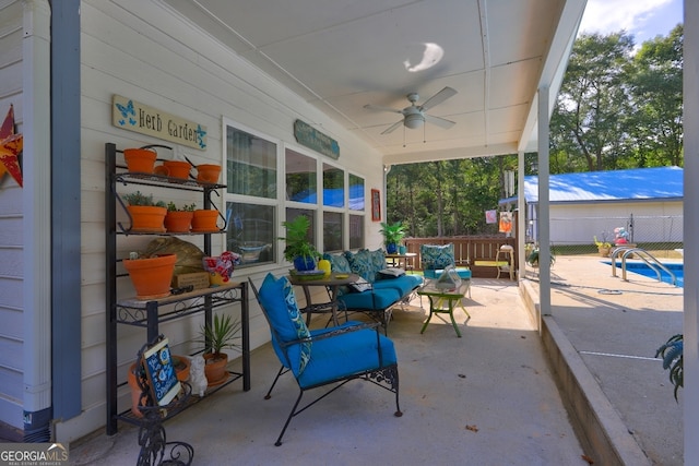 view of patio / terrace featuring ceiling fan