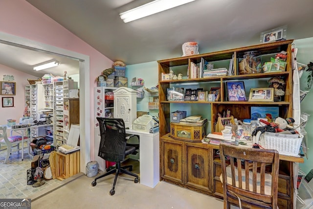 home office featuring vaulted ceiling