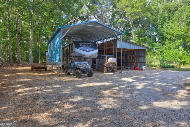 view of outdoor structure with a carport