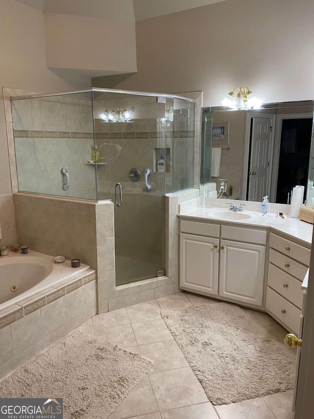 2631 Gladstone Ter, Woodstock, GA 30189 - bathroom with a stall shower, vanity, a whirlpool tub, and tile patterned floors