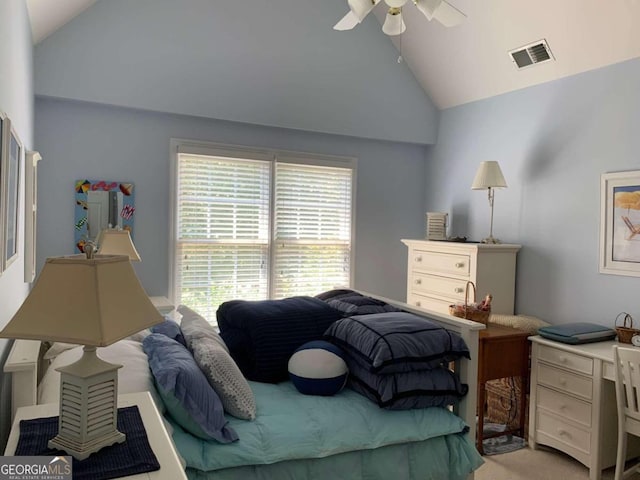 carpeted bedroom featuring high vaulted ceiling and ceiling fan