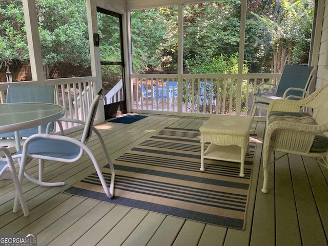 2631 Gladstone Ter, Woodstock, GA 30189 - sunroom featuring outdoor dining area and plenty of natural light