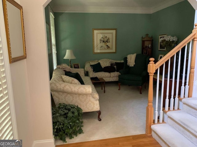 2631 Gladstone Ter, Woodstock, GA 30189 - living room featuring stairway, ornamental molding, arched walkways, and wood finished floors