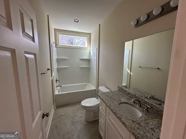 full bathroom featuring vanity, toilet, and tub / shower combination