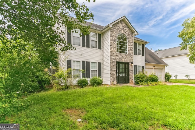 view of front of home with a front yard