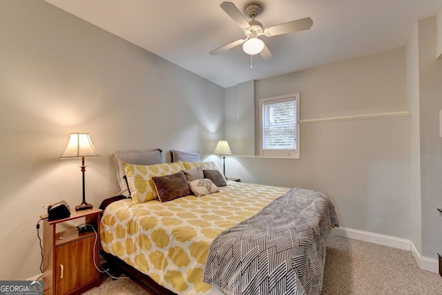 bedroom with ceiling fan and carpet