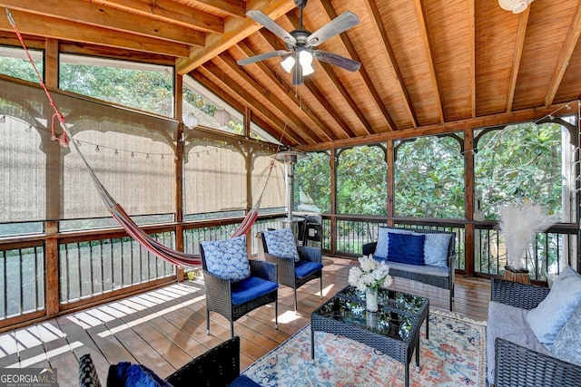 unfurnished sunroom featuring wooden ceiling, lofted ceiling with beams, and ceiling fan