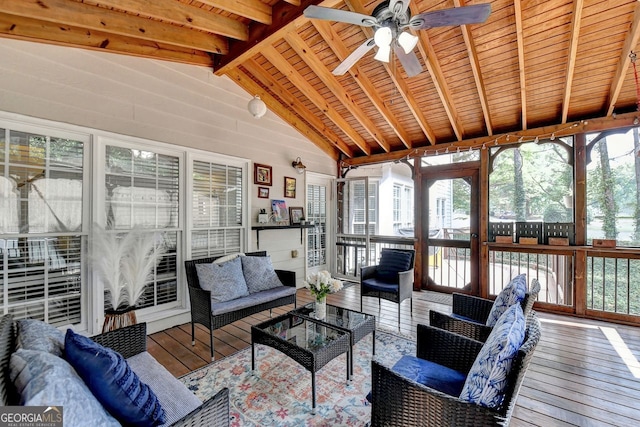 sunroom featuring wood ceiling, ceiling fan, and vaulted ceiling with beams