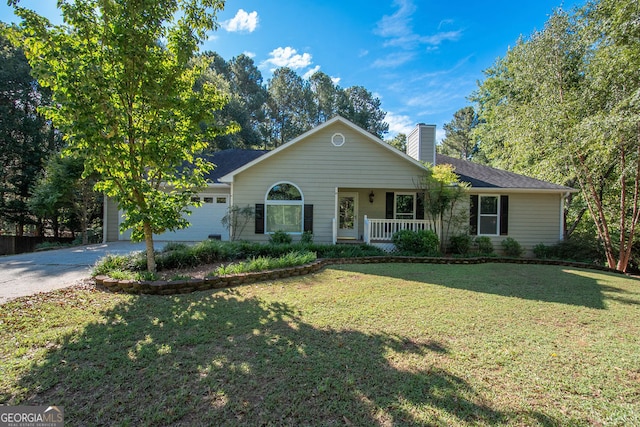 ranch-style house with a garage, a porch, and a front yard