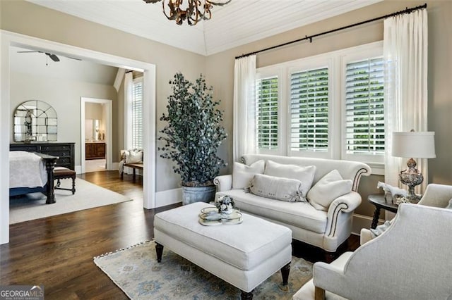 living room with vaulted ceiling, ceiling fan, and dark hardwood / wood-style floors