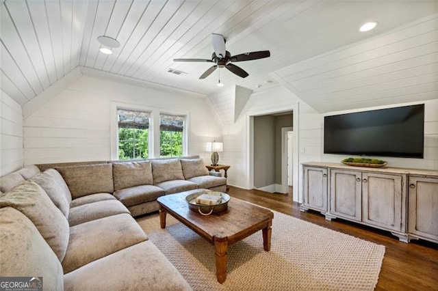 living room with ceiling fan, wood ceiling, dark hardwood / wood-style flooring, and vaulted ceiling