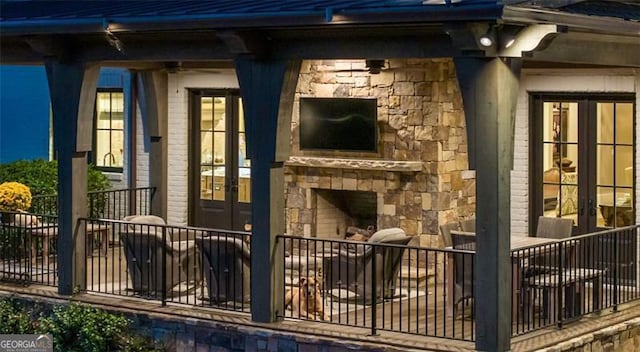 exterior space featuring an outdoor stone fireplace