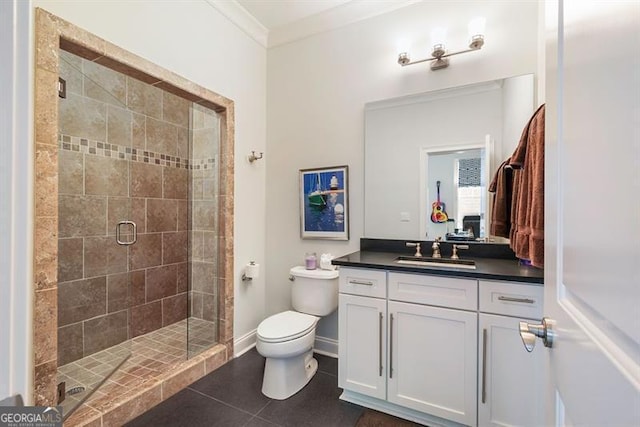 bathroom with an enclosed shower, crown molding, tile patterned floors, toilet, and vanity