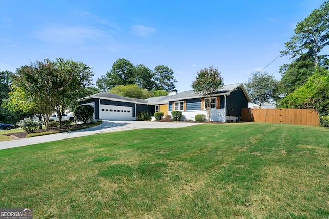 single story home with a garage and a front yard