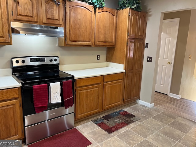 kitchen with stainless steel electric range oven