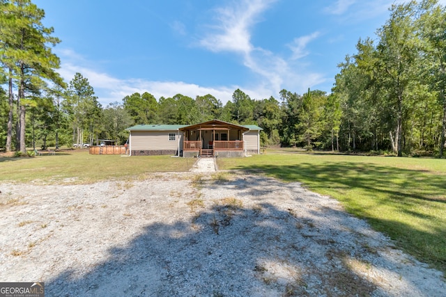 view of front of home with a front yard