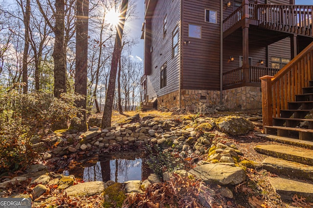 view of yard featuring a wooden deck