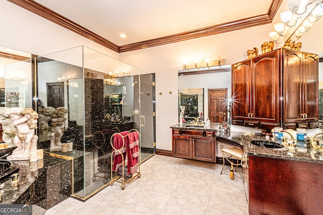 bathroom with crown molding and vanity