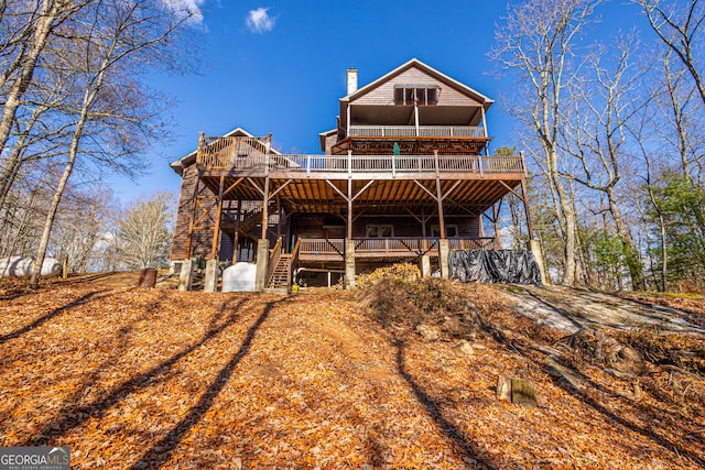 rear view of house with a deck