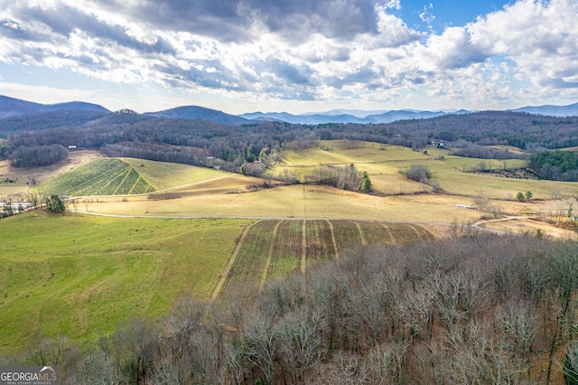 property view of mountains featuring a rural view