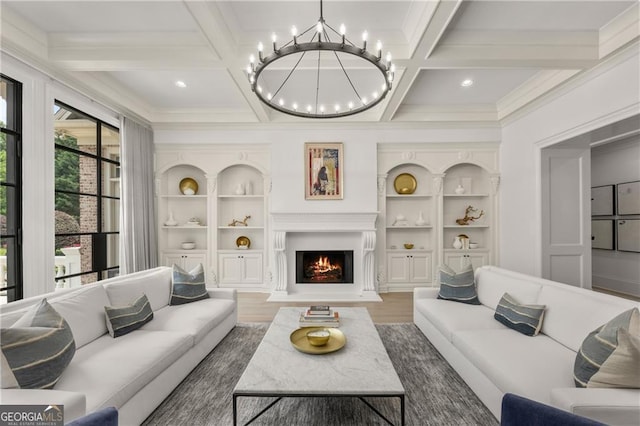 living room with coffered ceiling, beamed ceiling, built in shelves, a notable chandelier, and dark hardwood / wood-style flooring