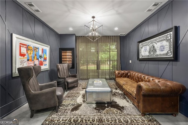 living area with an inviting chandelier