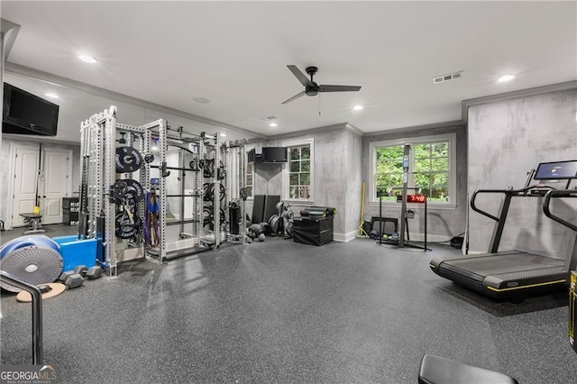 gym with crown molding and ceiling fan