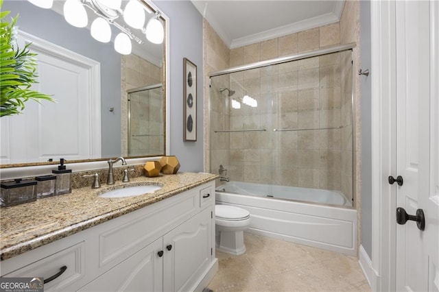 full bathroom with vanity, tile patterned flooring, toilet, ornamental molding, and enclosed tub / shower combo