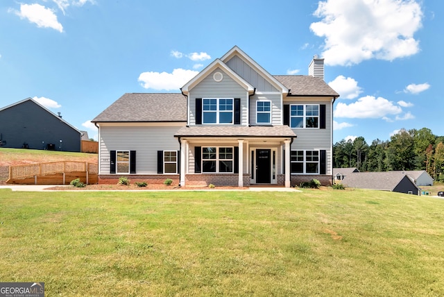 exterior space featuring a patio area and a front lawn