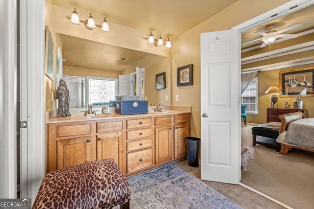 bathroom featuring vanity, ceiling fan, and tile patterned floors