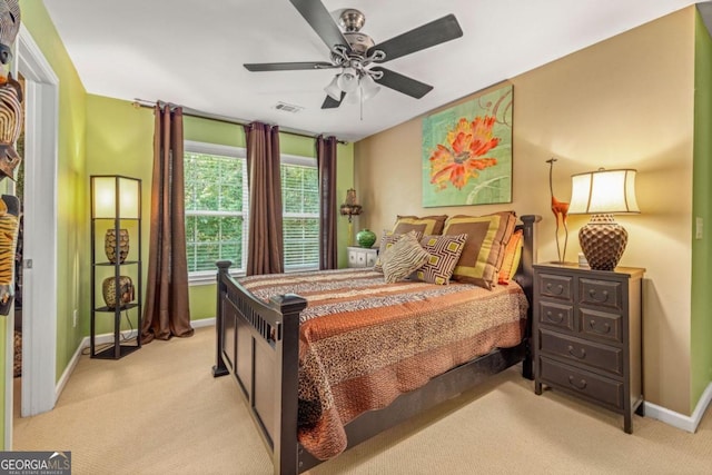 carpeted bedroom featuring ceiling fan