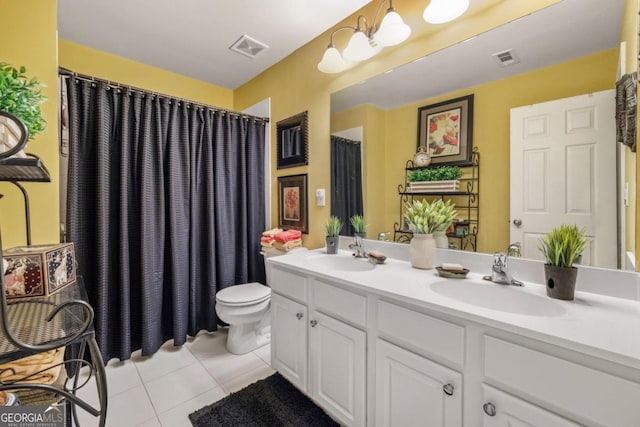 bathroom featuring tile patterned flooring, vanity, toilet, and a shower with shower curtain