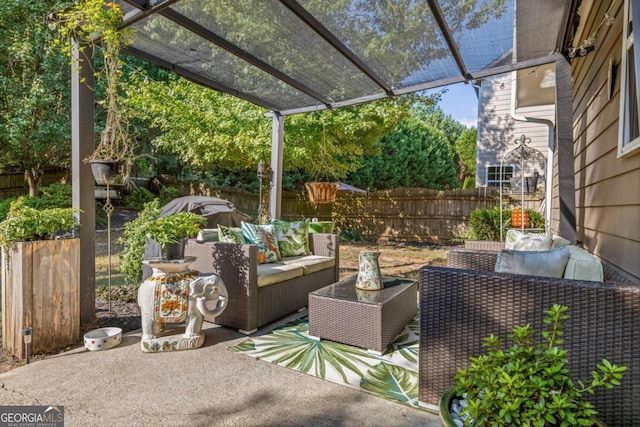 view of patio with an outdoor living space and a pergola