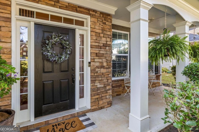 property entrance featuring a porch