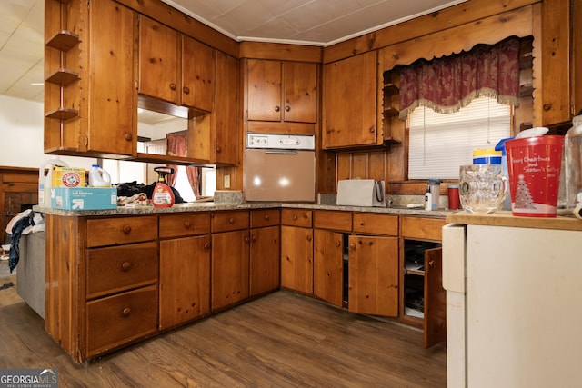 kitchen featuring dark hardwood / wood-style flooring and oven