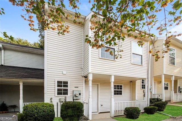 view of property with covered porch