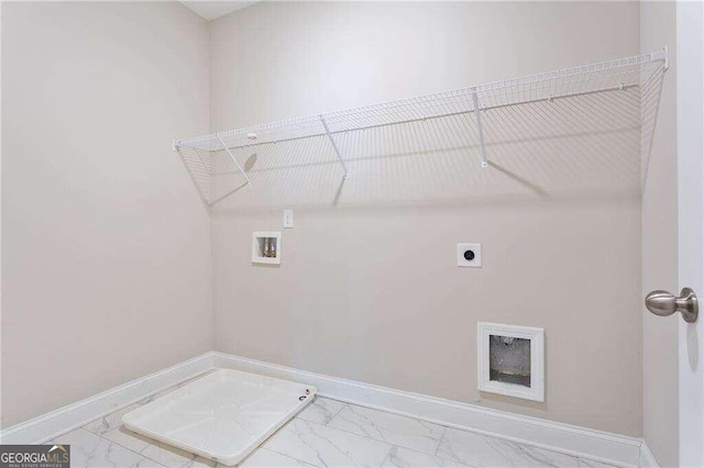 laundry area with hookup for an electric dryer and washer hookup