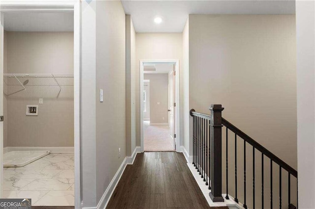 hallway featuring hardwood / wood-style flooring